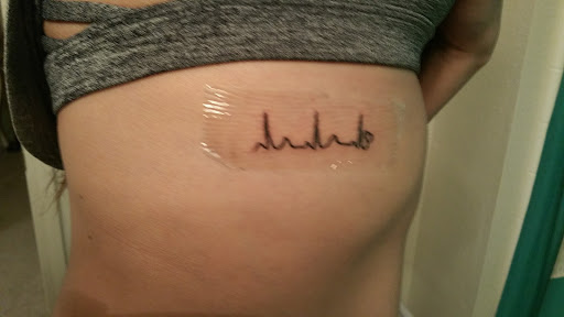 Explore december birth flower tattoo ideas, creative tattoo ideas in Mesa, available at The Tattoo Lounge