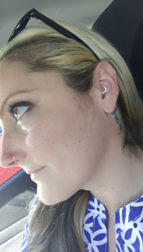 Explore back of ear tattoo ideas, creative tattoo ideas in Broken Arrow, available at Just Another Hole