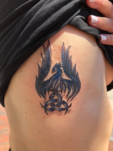 Explore cherub angel tattoo ideas, creative tattoo ideas in Nashua, available at Mayhem Ink Tattoo