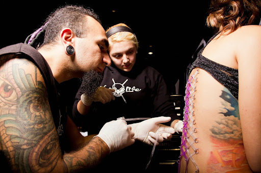 Explore feather tattoo ideas for men, creative tattoo ideas in Sarasota, available at Z-Edge Tattoo and Body Piercing North Shop