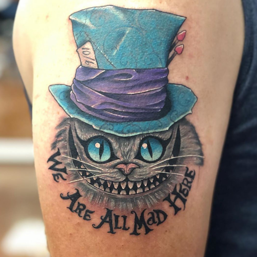 Explore postage stamp tattoo ideas, creative tattoo ideas in Aledo, available at Elevated Tattoo & Piercing
