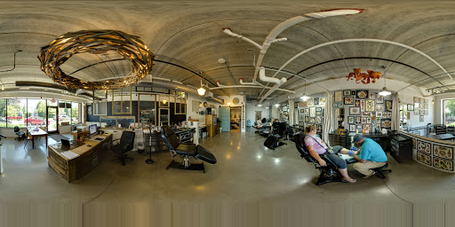 Explore dandelion tattoo ideas, creative tattoo ideas in Duluth, available at Benchmark Tattoo