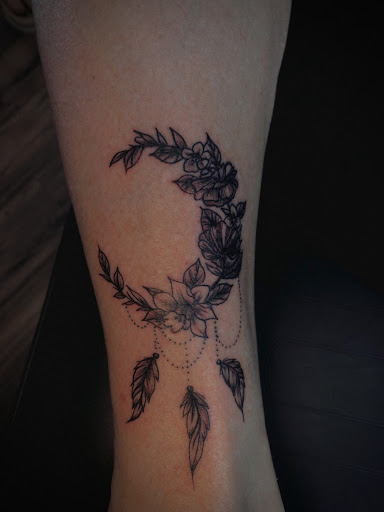 Explore mens upper arm tattoo ideas, creative tattoo ideas in North Tonawanda, available at Dark Side Ink Tattoo Studio