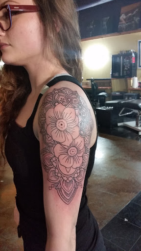 Explore bull riding tattoo ideas, creative tattoo ideas in Wylie, available at Scarecrow Galleries Tattoo Company