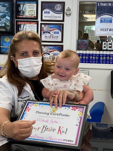 Explore girl thigh tattoo ideas, creative tattoo ideas in Myrtle Beach, available at Professional Body Piercing by Jackie