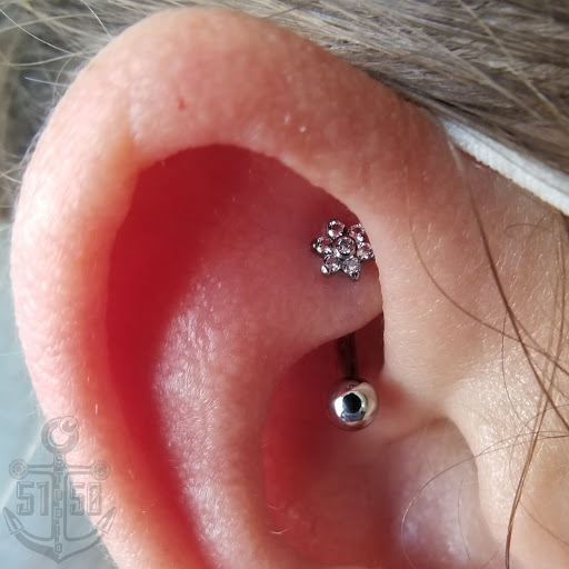 Explore saint michael tattoo ideas, creative tattoo ideas in Kearney, available at Studio 5150 Piercing & Fine Jewelry