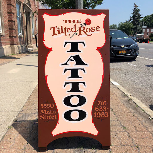 Find under the breast tattoo ideas for your next unique tattoo in Buffalo at The Tilted Rose Tattoo