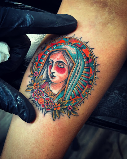 Explore undertaker tattoo ideas, creative tattoo ideas in Madera, available at Sea Wolf Tattoo