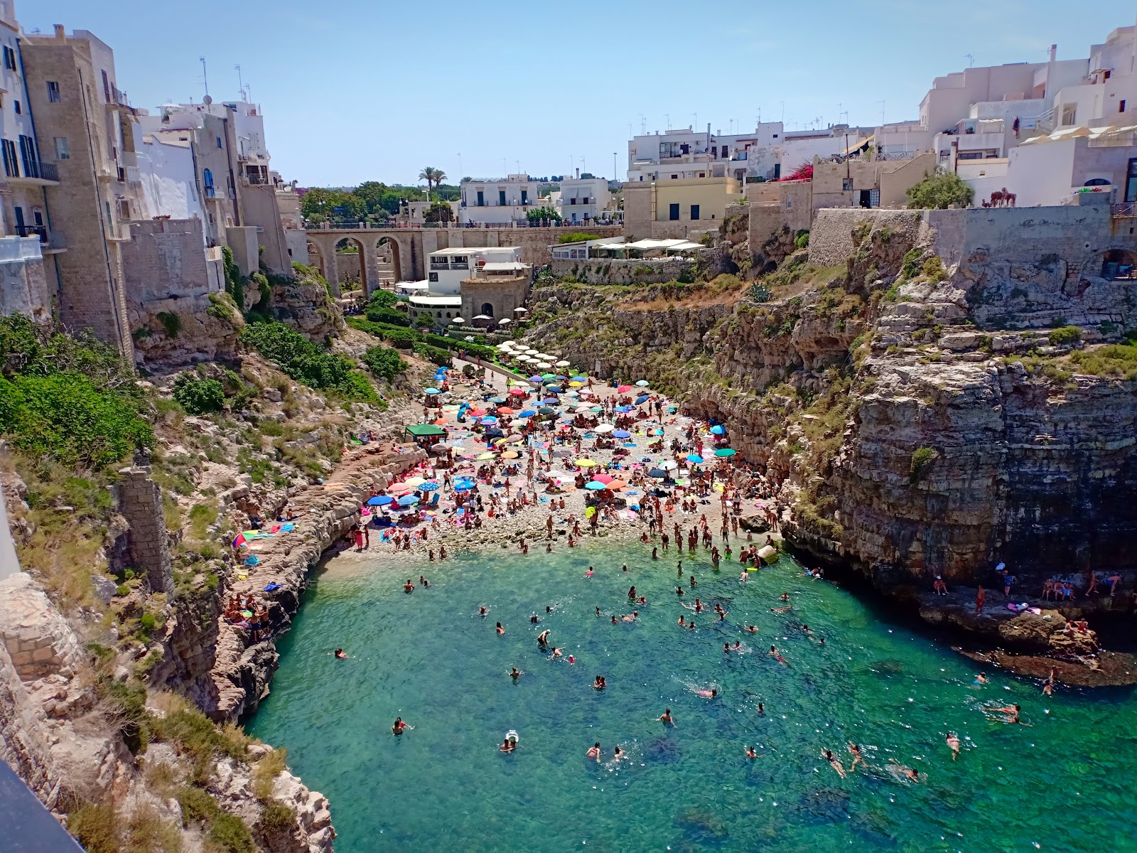 Photo of Lama Monachile beach and the settlement