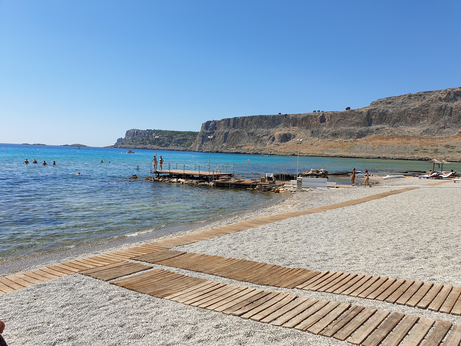 Zdjęcie Mitsis Lindos Plaża II z powierzchnią beżowe kamyki