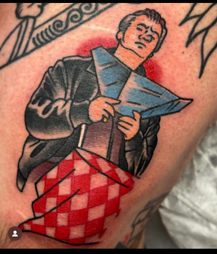 Explore tattoo ideas behind the ear tattoos, creative tattoo ideas in Newburgh, available at Millennium Tattoo