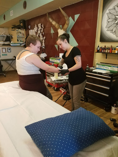 Explore daughter and son tattoo ideas, creative tattoo ideas in Eugene, available at Northwest Tattoo