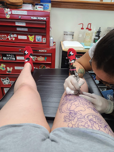 Explore breathe tattoo ideas, creative tattoo ideas in Hampton, available at Blue Horseshoe Tattoo and Body Piercing