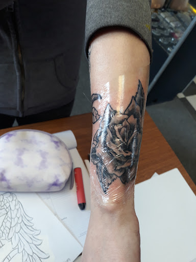 Explore chrysanthemum tattoo november birth flower tattoo ideas, creative tattoo ideas in Newport, available at T N T Explosive Tattoo