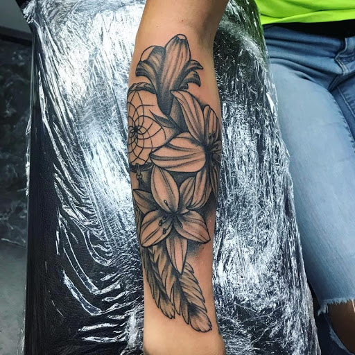 Explore formula 1 tattoo ideas, creative tattoo ideas in Berea, available at Self-Made Tattoo Studio