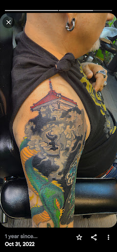 Explore wedding ring tattoo ideas male, creative tattoo ideas in Riverside, available at Darkstar Tattoo CA