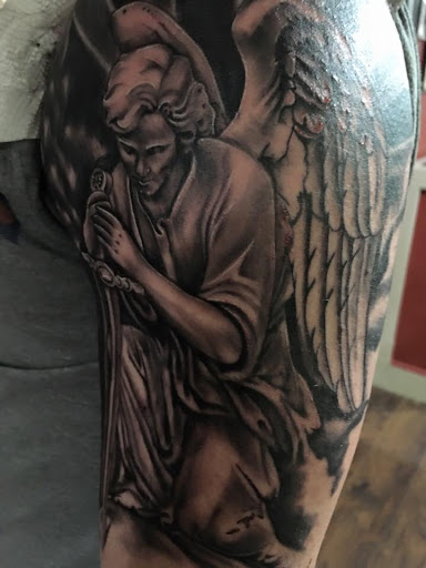 Explore firefighter tattoo ideas for guys, creative tattoo ideas in Kingsford, available at Deft Tattoo Studio