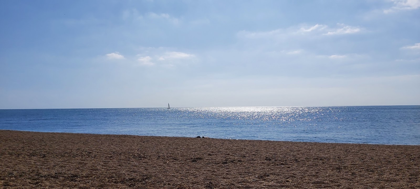 Foto af Rocken End Beach med turkis rent vand overflade