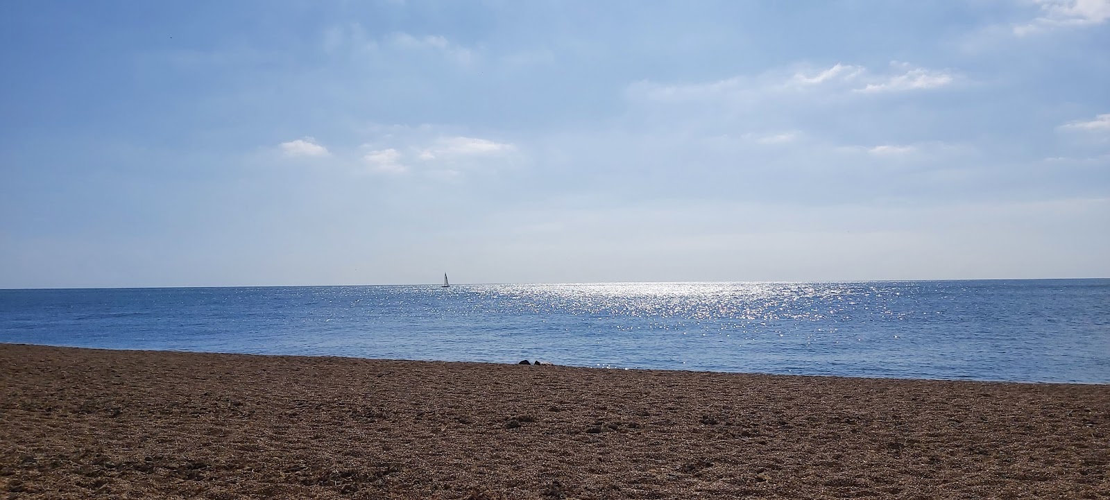 Rocken End Beach'in fotoğrafı düz ve uzun ile birlikte