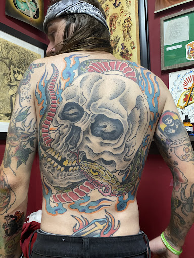 Find top of shoulder tattoo ideas for your next unique tattoo in Peabody at Thousand Needles Tattoo