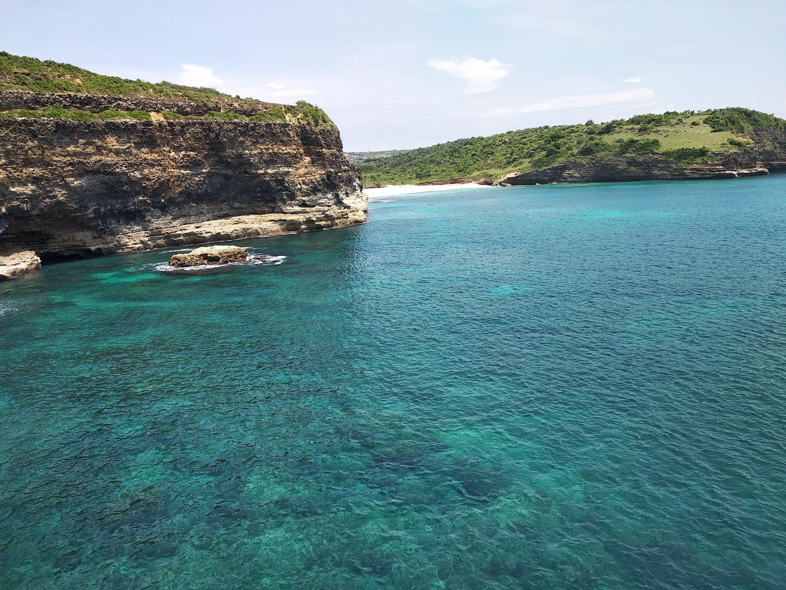 Fotografija Mankgu Guru Beach z turkizna čista voda površino