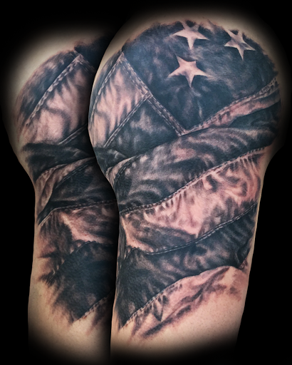 Explore patriotic sleeve tattoo ideas, creative tattoo ideas in Buford, available at Norsk Studios Tattoos & Piercings