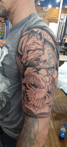 Tattoo Shop «Eclectic Art Tattoo Gallery», reviews and photos, 615 E Michigan Ave, Lansing, MI 48912, USA