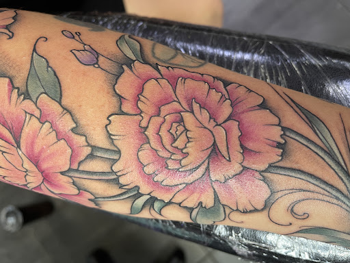 Explore arm cross tattoo ideas, creative tattoo ideas in Deerfield Beach, available at Black Rose Tattoo Studio