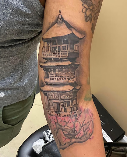 Explore shoulder tribal tattoo ideas, creative tattoo ideas in Warner Robins, available at Pen & Portrait Tattoos