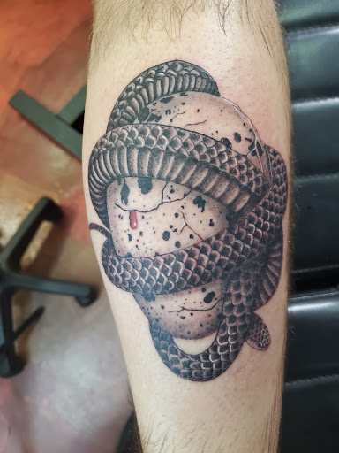 Explore tattoo ideas for belly, creative tattoo ideas in Inverness, available at The Perfect Spot Tattoos