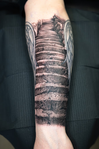 Explore brother tattoo ideas for guys, creative tattoo ideas in Independence, available at Bare Skin Tattoo