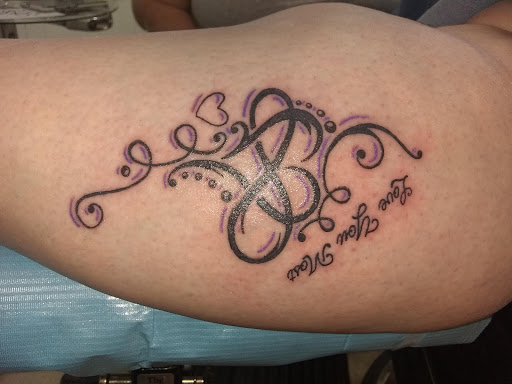 Explore trap house tattoo ideas, creative tattoo ideas in Peoria Heights, available at Twisted Vision Inc