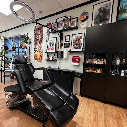 Find angel tattoo ideas for men for your next unique tattoo in Roy at Garden Gate Tattoo & Art Collective