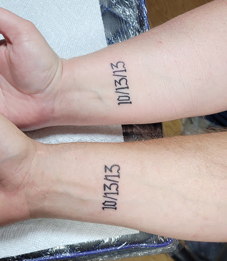 Explore arm cross tattoo ideas, creative tattoo ideas in Meridian, available at SK-Tattoo1