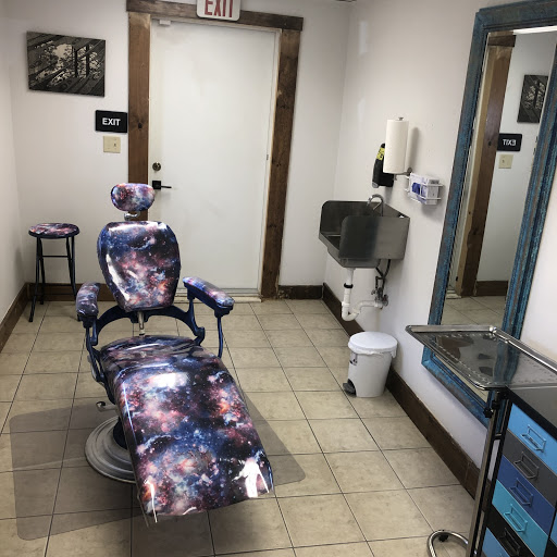 Explore underarm tattoo ideas, creative tattoo ideas in Edinboro, available at Tattarrattat Body Art Studio