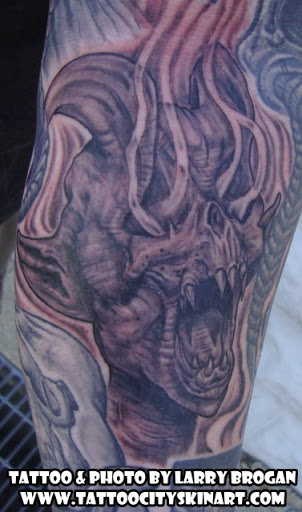 Explore narrow tattoo ideas, creative tattoo ideas in Lockport, available at Tattoo City by Larry Brogan