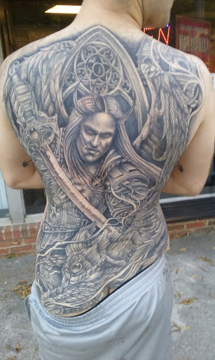 Explore small snake tattoo ideas, creative tattoo ideas in Chattanooga, available at Standard Ink Tattoo Co