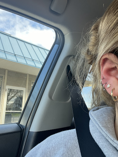 Explore cross hand tattoo ideas, creative tattoo ideas in Fredonia, available at True Blue Tattoo