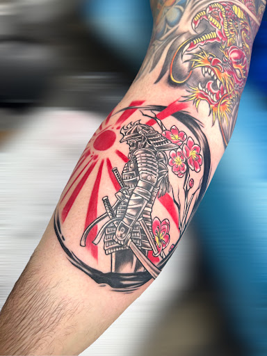 Explore matching tattoo ideas for friends, creative tattoo ideas in Athol, available at Ragnark Tattoo Company