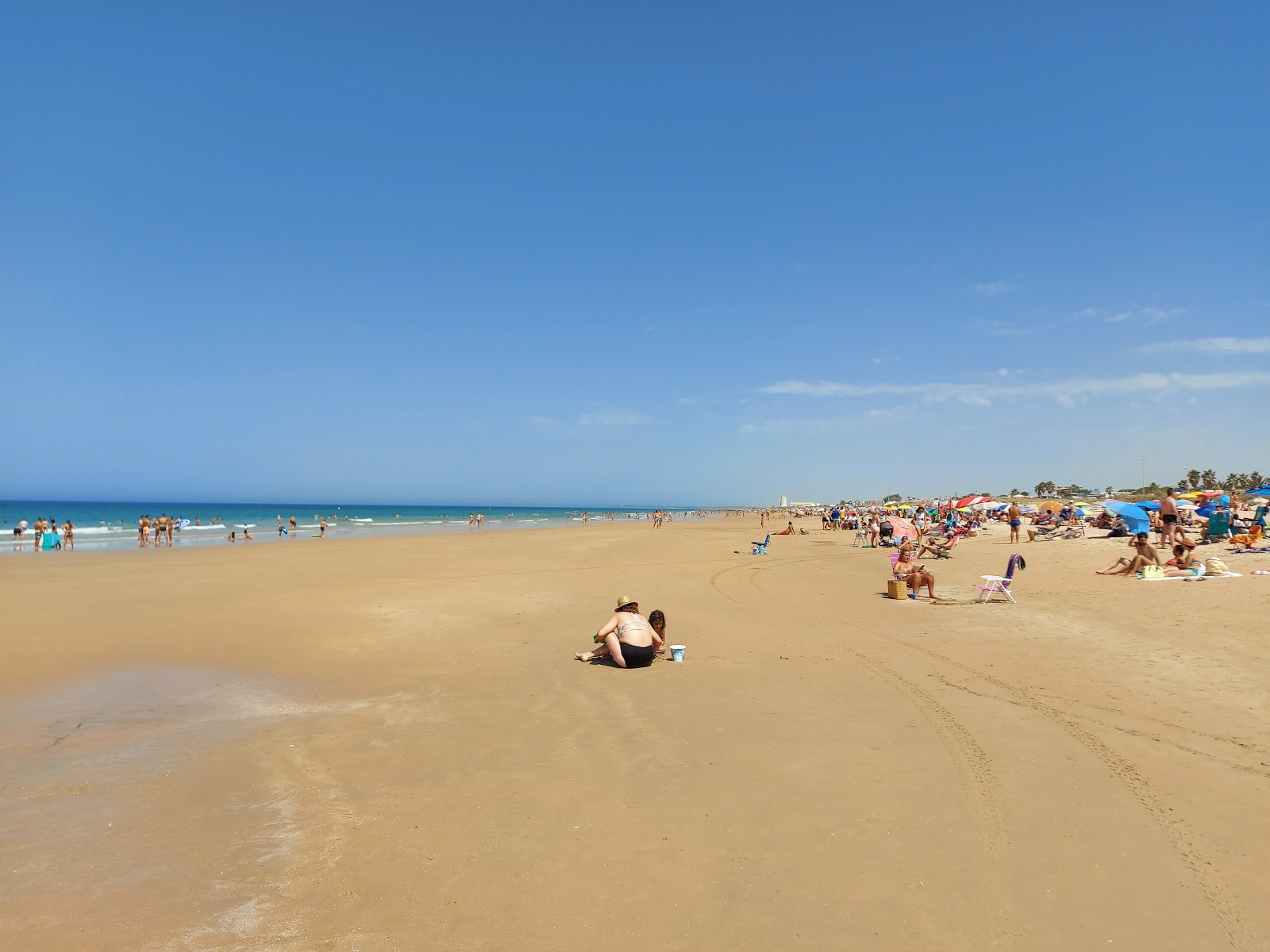 Photo of El Palmar Beach with blue pure water surface