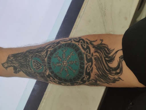 Explore titanic tattoo ideas, creative tattoo ideas in Pittsfield, available at Rockn Ink