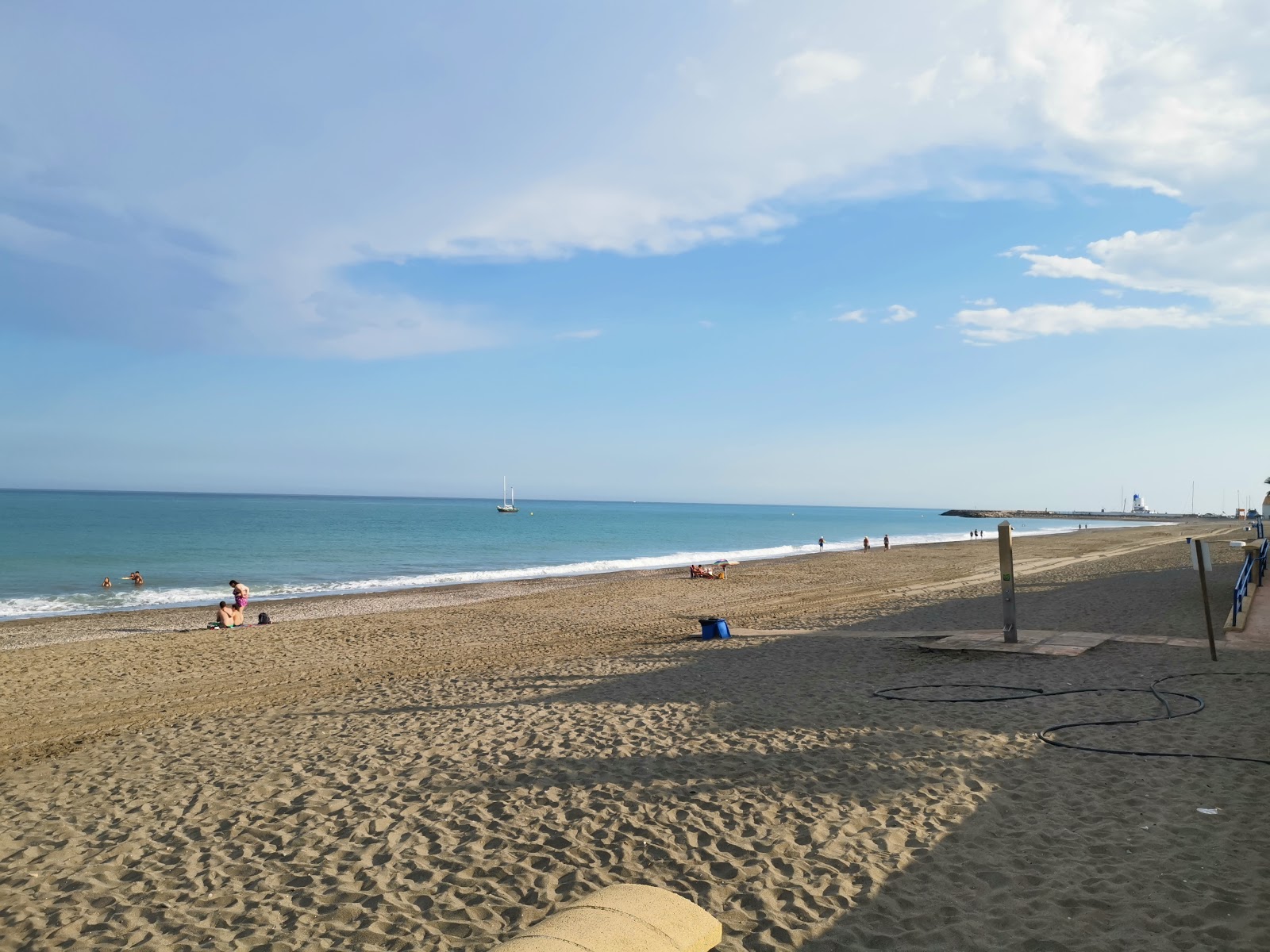 Photo of Chiringuito beach with blue pure water surface