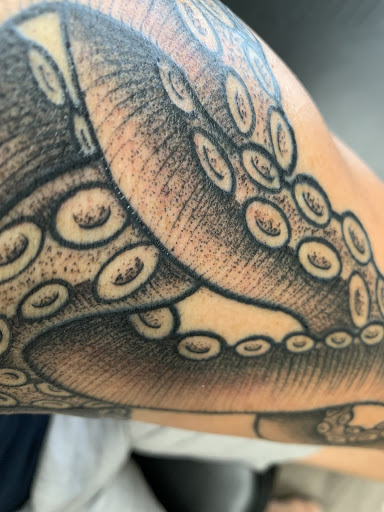 Explore ski tattoo ideas, creative tattoo ideas in Carmel, available at Phong Tattoo
