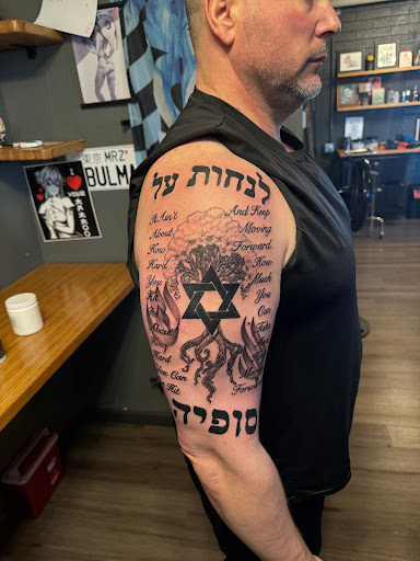 Explore burn the ships tattoo ideas, creative tattoo ideas in Peoria, available at Mad Tatter Kustoms