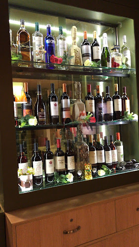 Amaretto Pizza, Grill & Drinks - Pizzeria