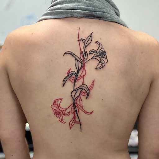 Explore women's leg tattoo ideas, creative tattoo ideas in Prairieville, available at Nolana Tattoo & Piercing