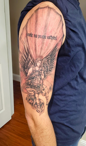 Explore godfather tattoo ideas, creative tattoo ideas in Pittsburg, available at NeonMoon Tattoo