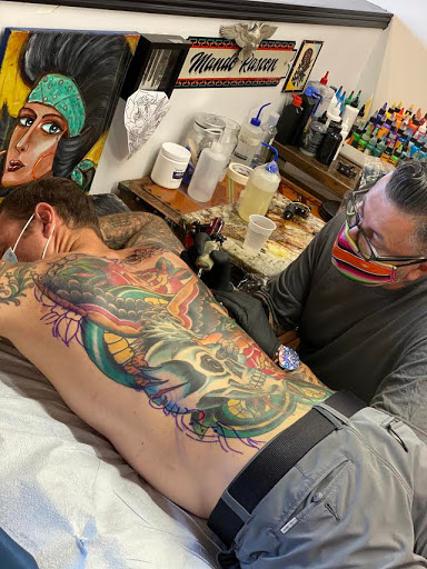 Explore lion tattoo ideas for females, creative tattoo ideas in Gilbert, available at Fifth Estate Tattoo