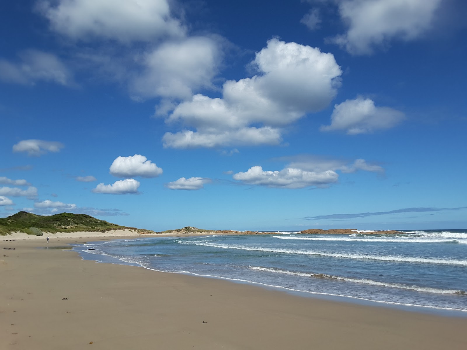 Foto von Lighthouse Beach mit lange, gerade küste