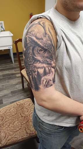 Explore railroad tattoo ideas, creative tattoo ideas in Warner Robins, available at Untold Pain Tattoo Studio